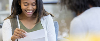 An image of a student reviewing paperwork.